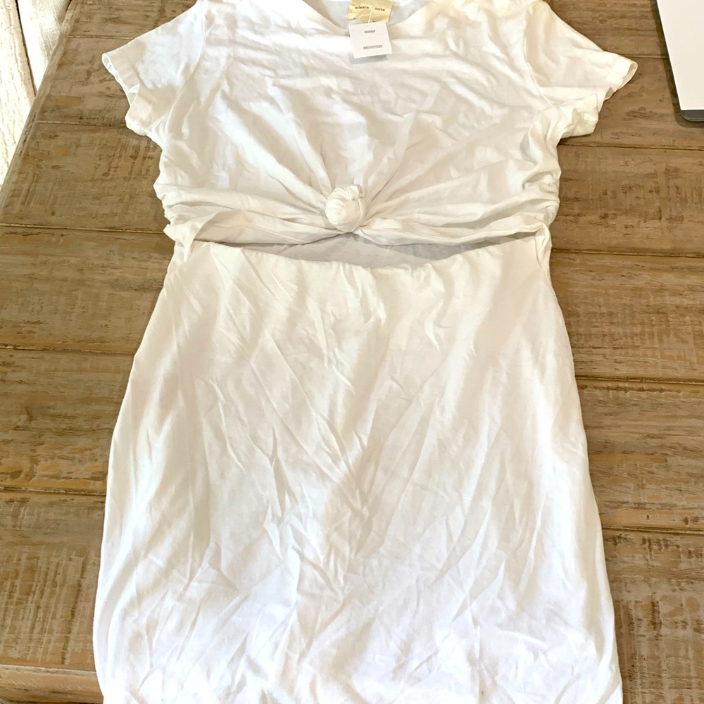 Beautiful white dress just screaming for the beach